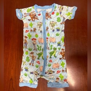 Little Sleepies Toy Story short romper size 12-18 months.